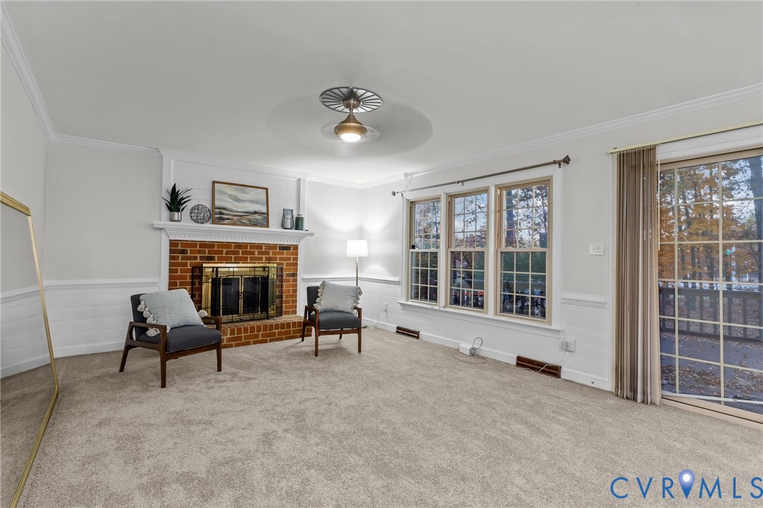 12601 Cottage Mill Road Midlothian, VA 23114 - Photo 38 of 50 a living room with furniture and a fireplace