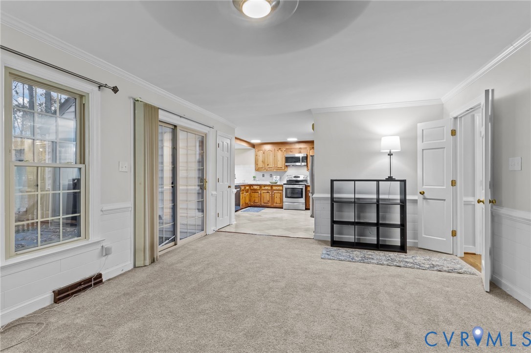 12601 Cottage Mill Road Midlothian, VA 23114 - Photo 39 of 50 an empty room with a window and walk in closet