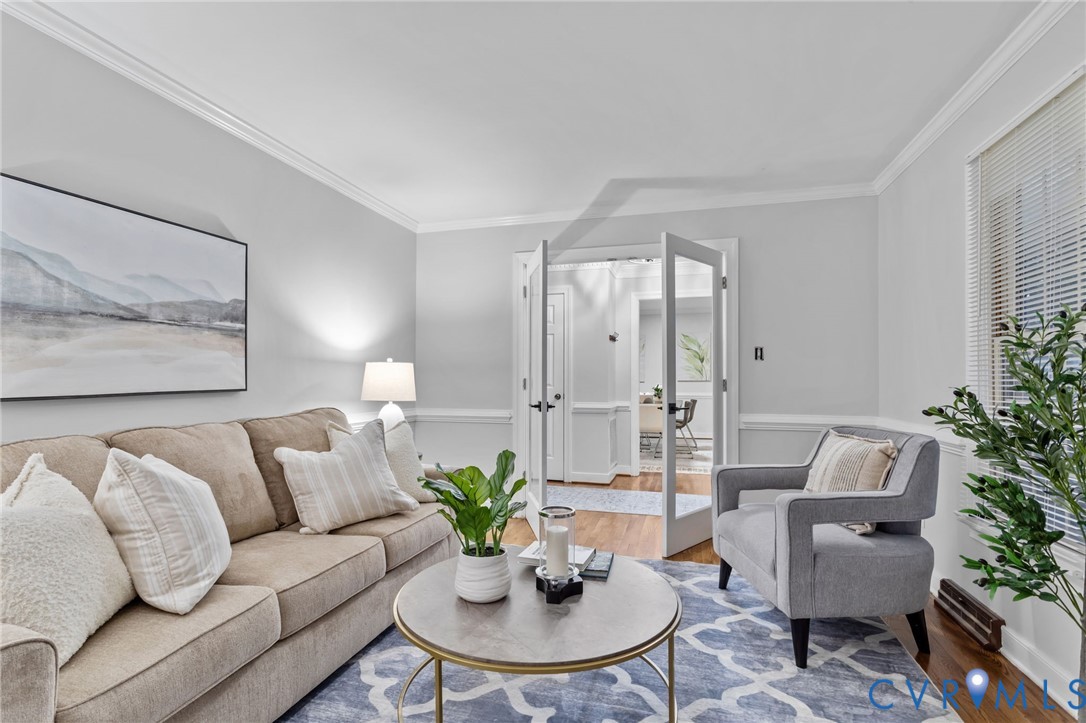 12601 Cottage Mill Road Midlothian, VA 23114 - Photo 41 of 50 a living room with furniture potted plant and a window