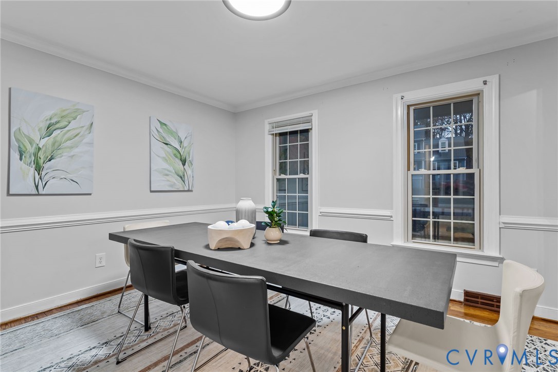 12601 Cottage Mill Road Midlothian, VA 23114 - Photo 42 of 50 a view of a dining room with furniture window and wooden floor