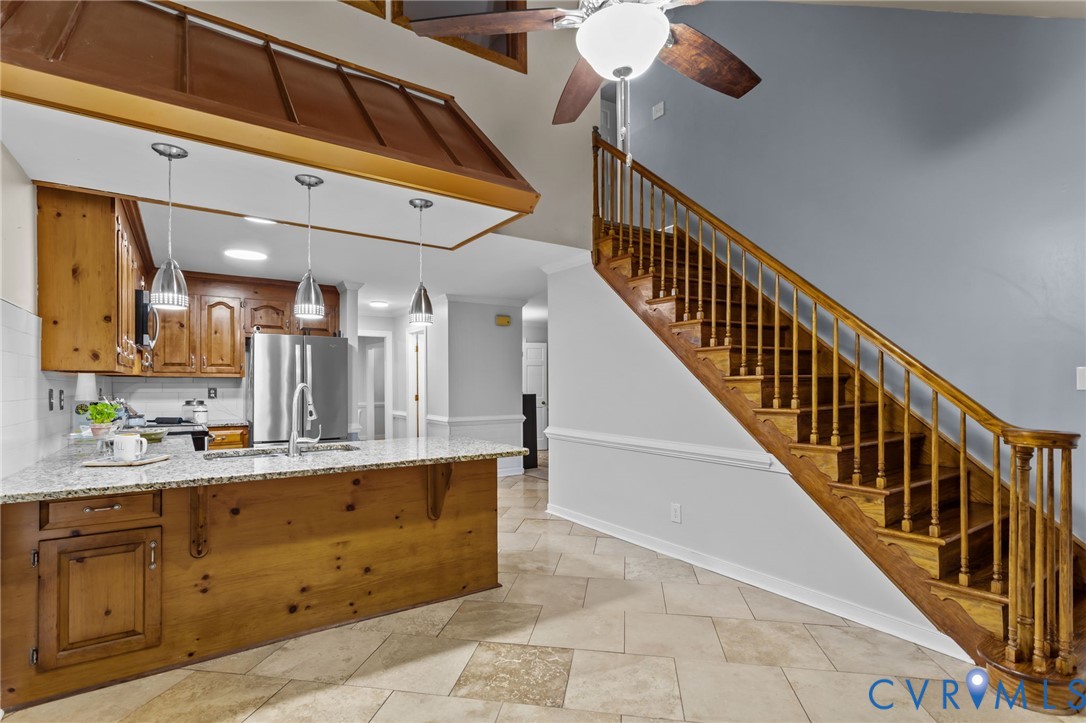 12601 Cottage Mill Road Midlothian, VA 23114 - Photo 45 of 50 a view of a kitchen cabinets and chandelier