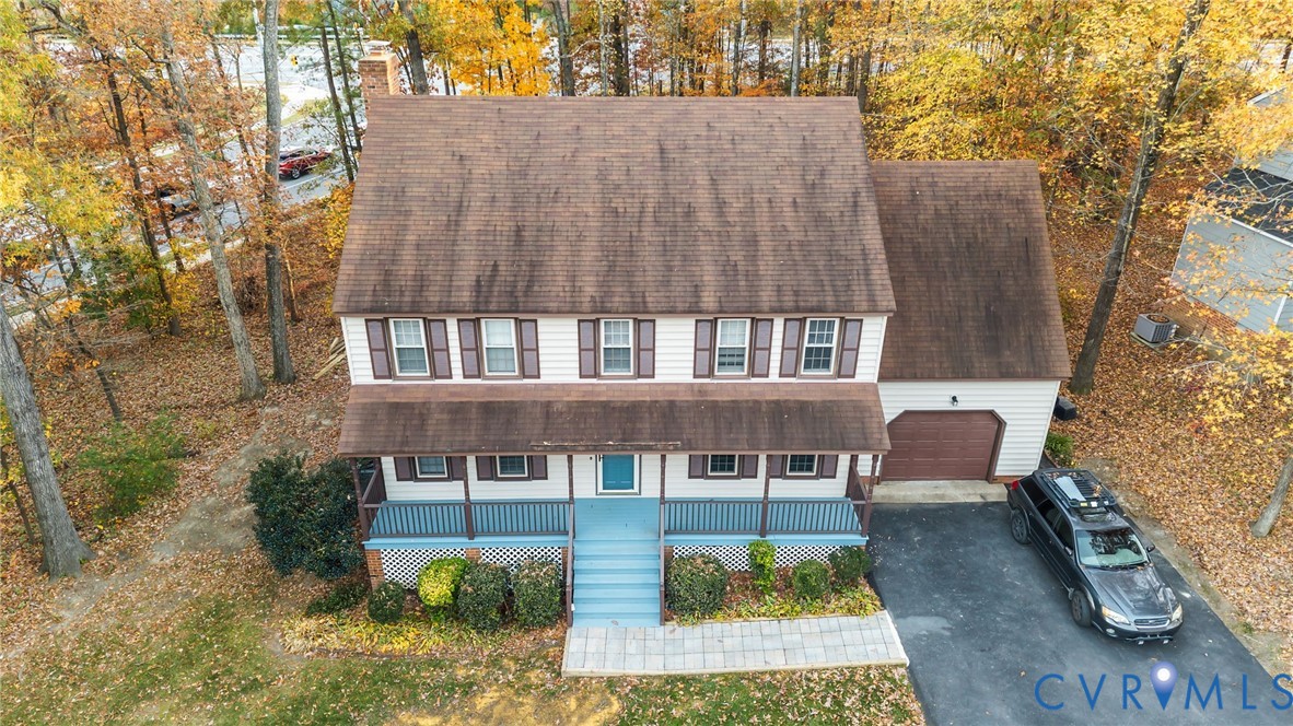 12601 Cottage Mill Road Midlothian, VA 23114 - Photo 5 of 50 a aerial view of a house with a yard
