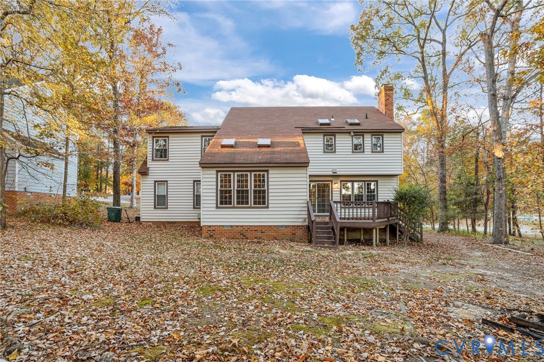 12601 Cottage Mill Road Midlothian, VA 23114 - Photo 7 of 50 a view of a house with a table and chairs