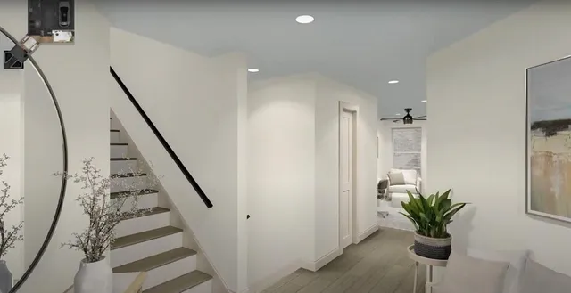 a view of entryway with wooden floor