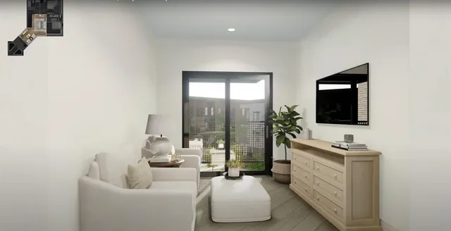 a en suite bathroom with a double vanity sink a mirror and a bathtub
