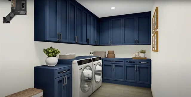a utility room with washer and dryer