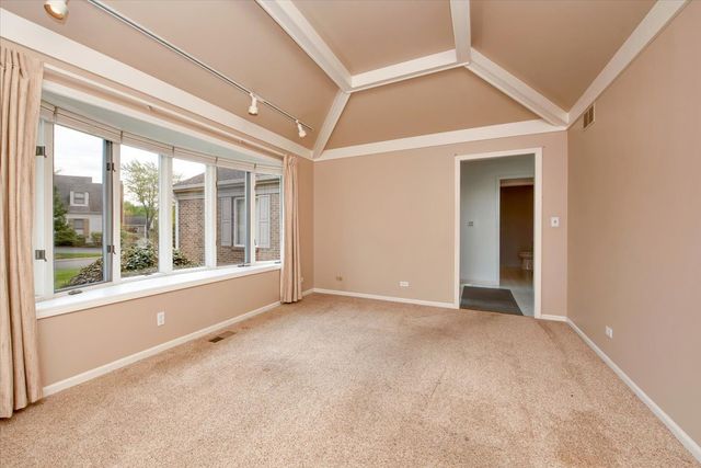 a bathroom with a sink vanity and mirror