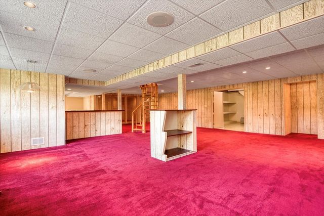 a view of a patio with a yard