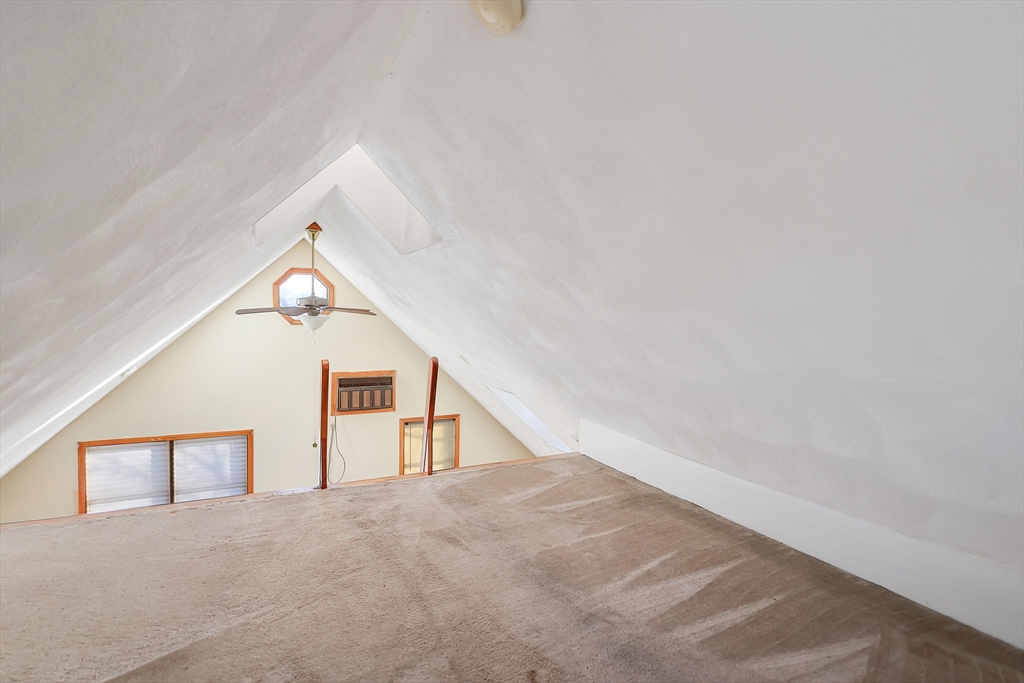 11 Warwick Street, Unit 3 Lowell, MA 01851 - Photo 11 of 23 a view of staircase with white walls