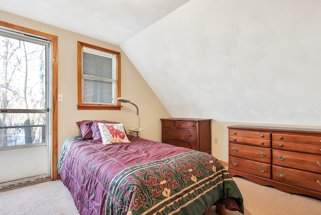 11 Warwick Street, Unit 3 Lowell, MA 01851 - Photo 13 of 23 a bedroom with a bed and a closet