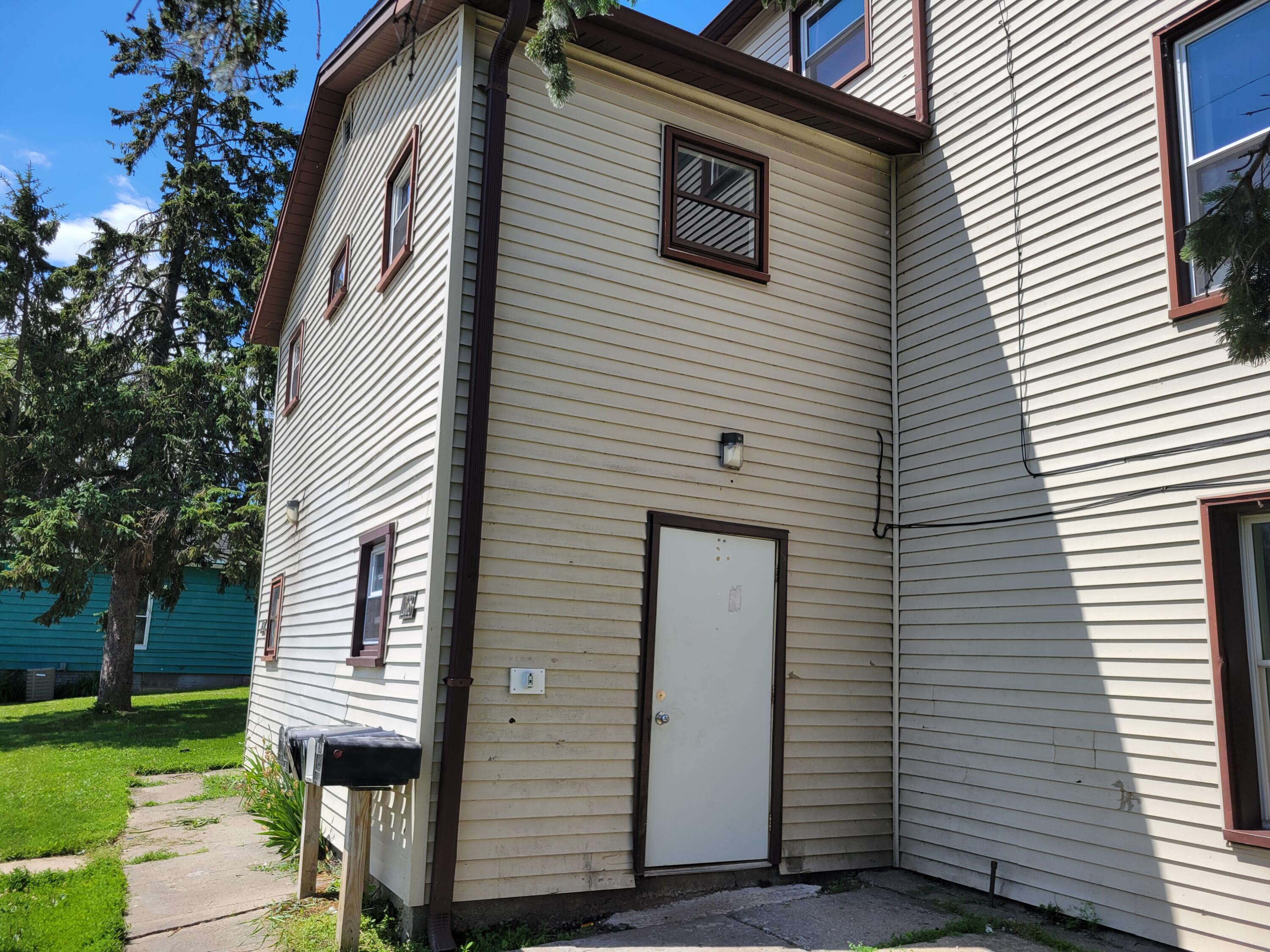 1028 South Memorial Drive Racine, WI 53403 - Photo 2 of 18 Lockbox on This Door