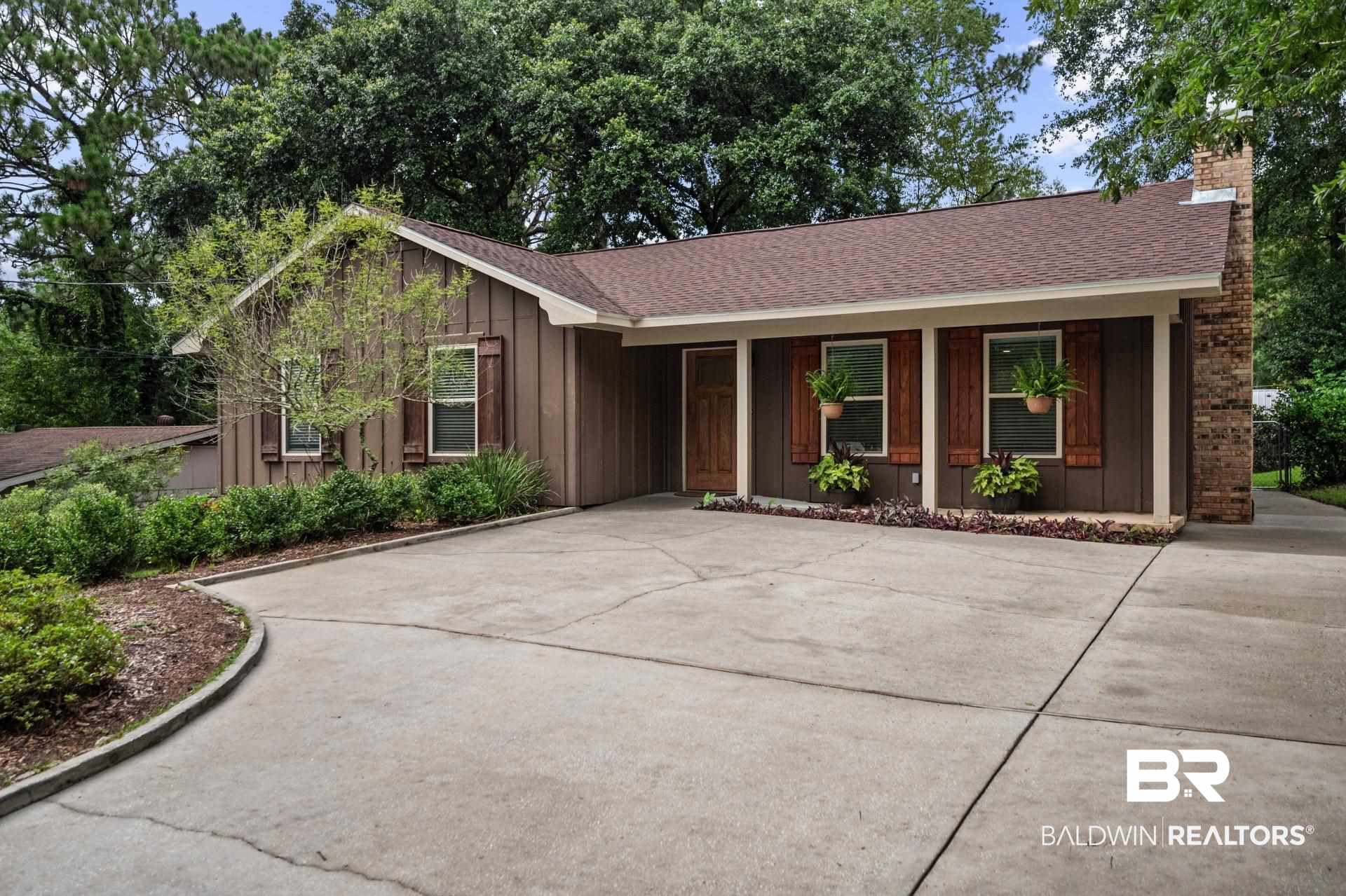 409 Rosa Avenue Fairhope, AL 36532 - Photo 3 of 31 street view