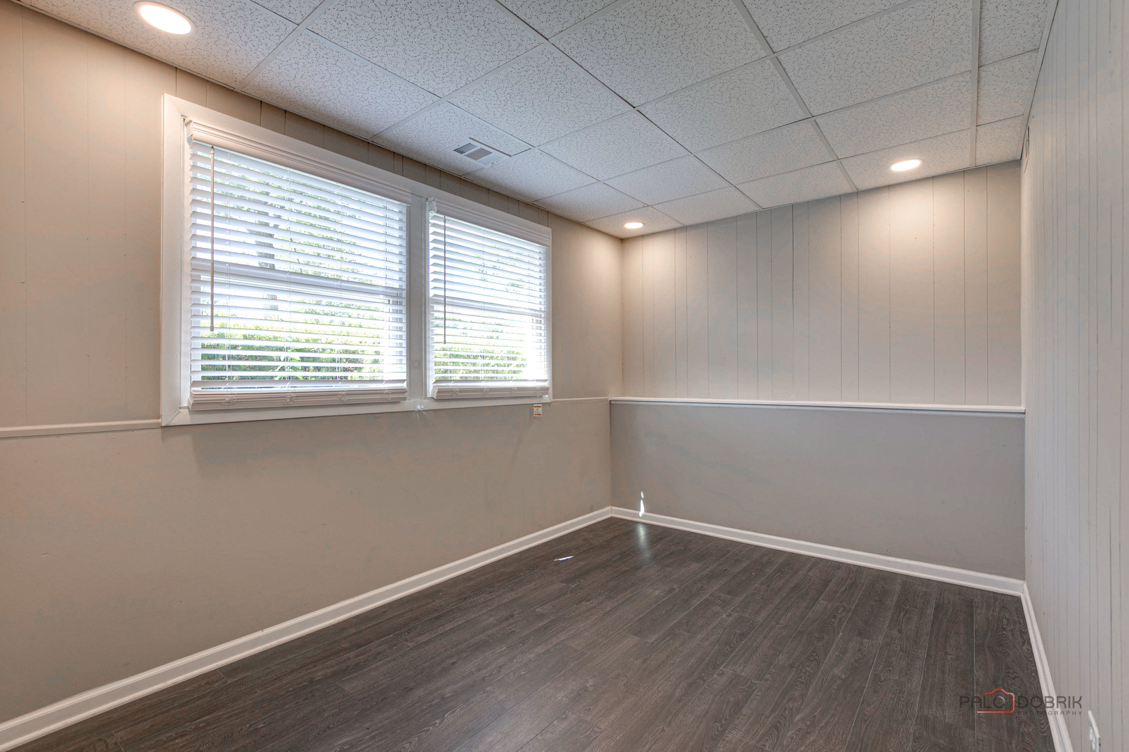 1030 Hassell Road Hoffman Estates, IL 60169 - Photo 21 of 35 an empty room with wooden floor and windows