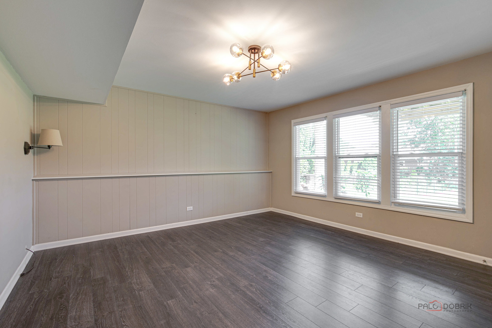 1030 Hassell Road Hoffman Estates, IL 60169 - Photo 23 of 35 wooden floor in an empty room with a window