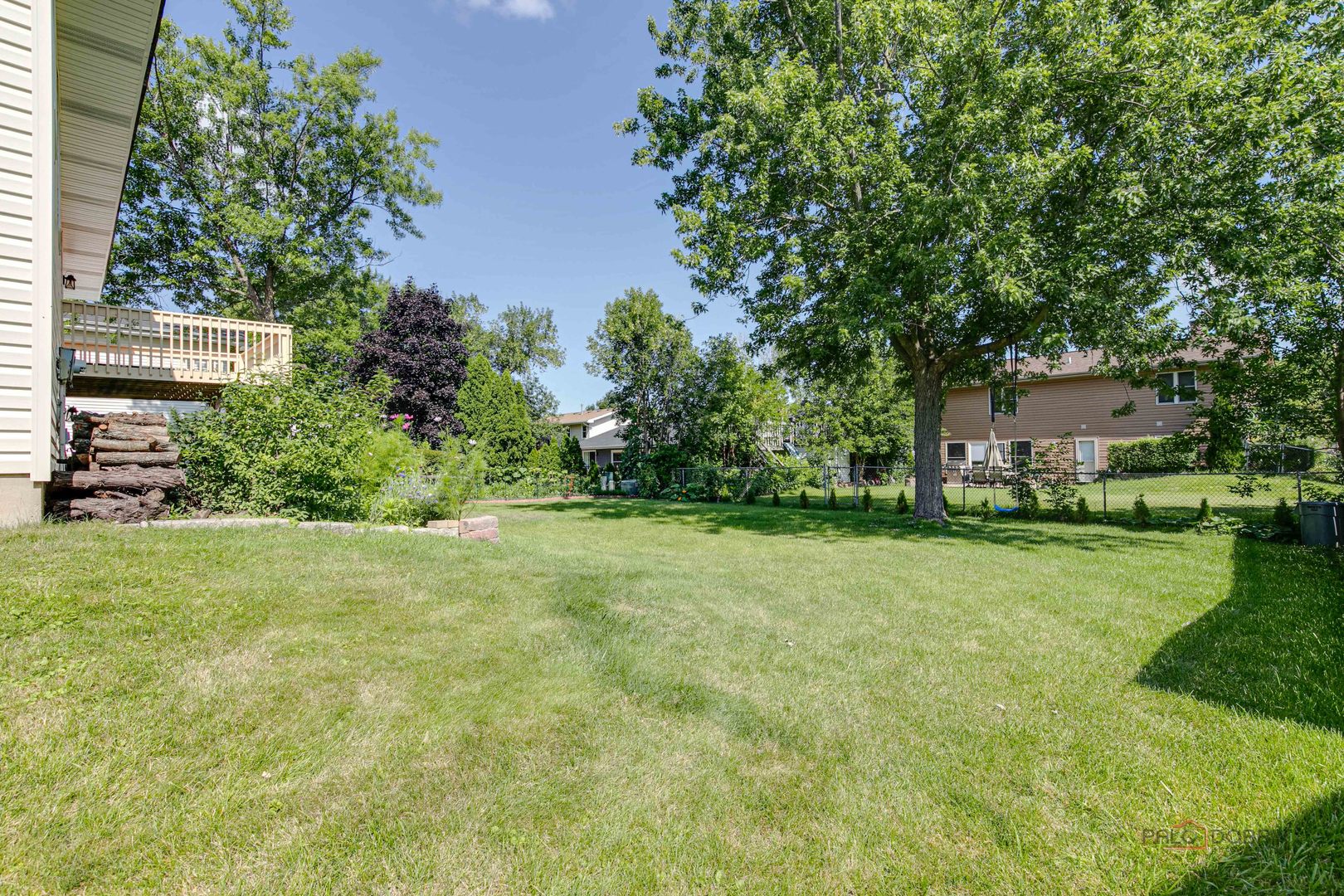 1030 Hassell Road Hoffman Estates, IL 60169 - Photo 30 of 35 a view of a house with backyard and garden