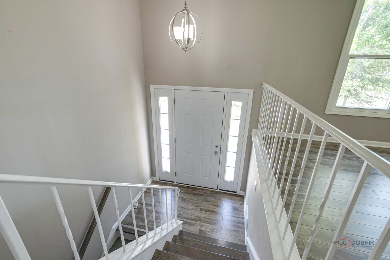 1030 Hassell Road Hoffman Estates, IL 60169 - Photo 8 of 35 a view of entryway with wooden floor
