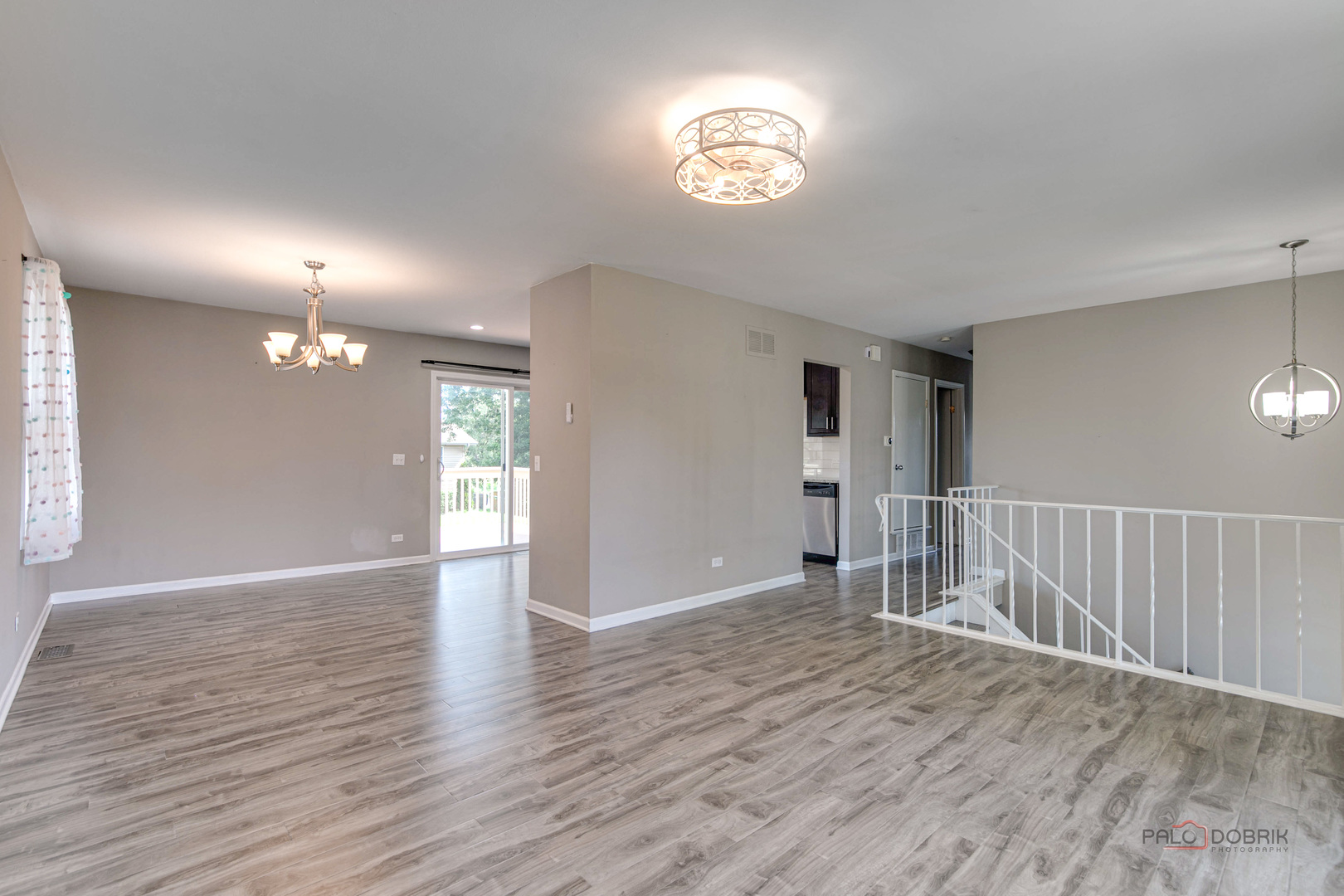 1030 Hassell Road Hoffman Estates, IL 60169 - Photo 10 of 35 a view of a hallway with wooden floor