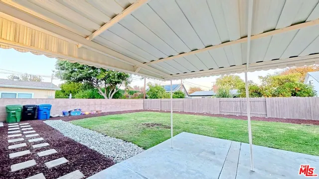 a view of a backyard with a garden