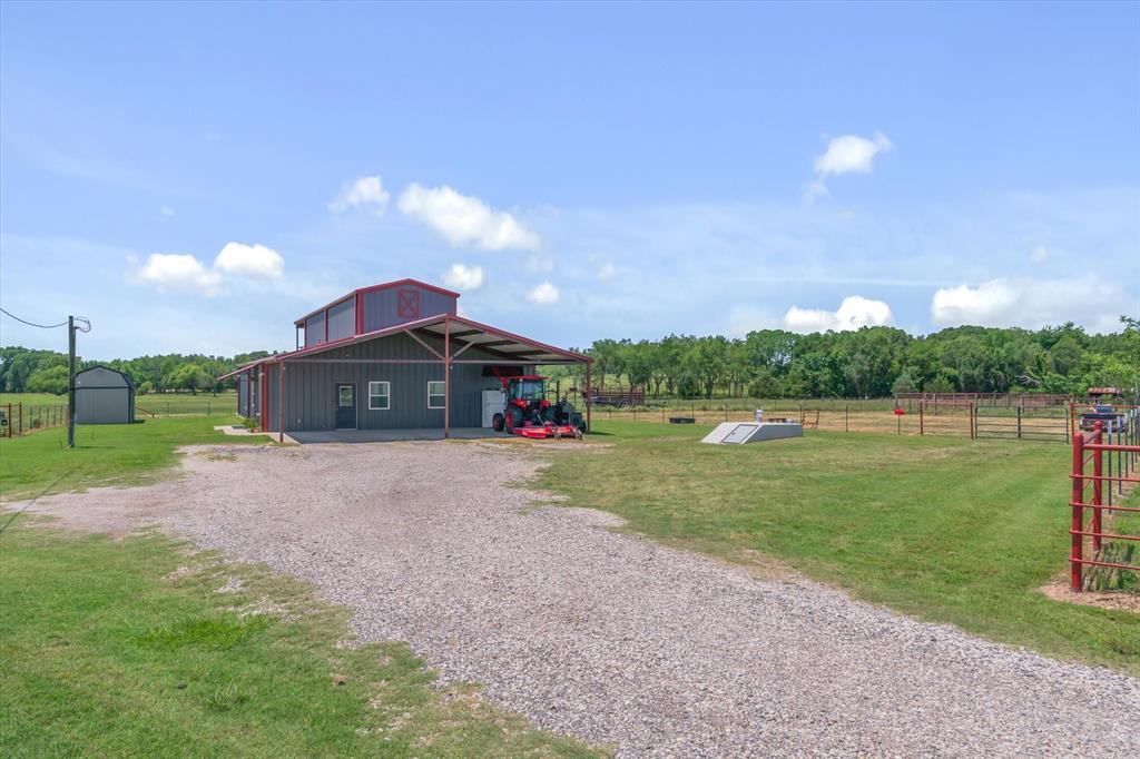 1026 VZ County Road Canton, TX 75103 - Photo 2 of 40 a view of a house with a yard and a large tree