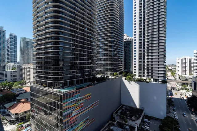 a view of an empty room with glass door