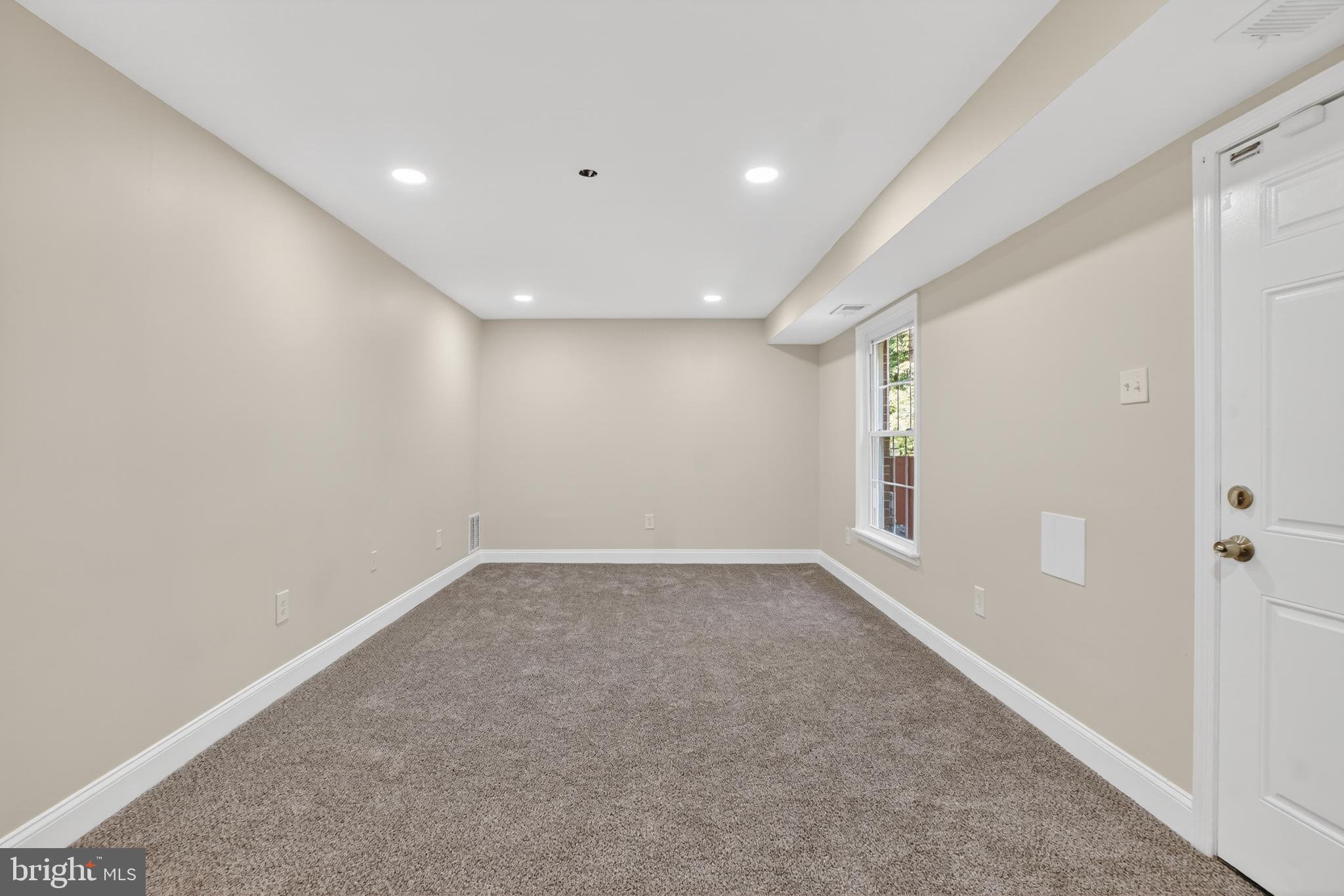 1232 Palmer Road, Unit 111 Fort Washington, MD 20744 - Photo 36 of 45 a view of an empty room with a window