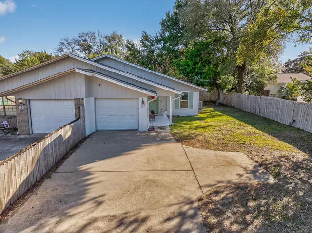 a view of backyard of house