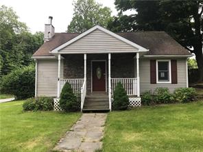 16 Reading Road Patterson, NY 12563 - Photo 1 of 1 a front view of a house with garden