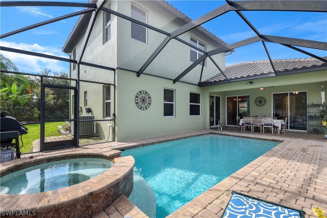 12831 Timber Ridge Drive Fort Myers, FL 33913 - Photo 13 of 16 a view of swimming pool with seating area