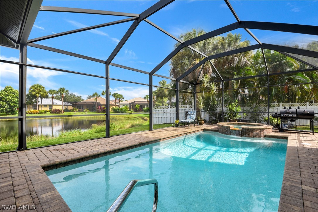 12831 Timber Ridge Drive Fort Myers, FL 33913 - Photo 15 of 16 a view of swimming pool with a patio