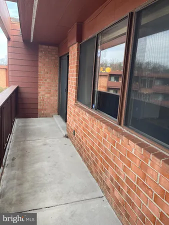 a view of a park with slide sitting area