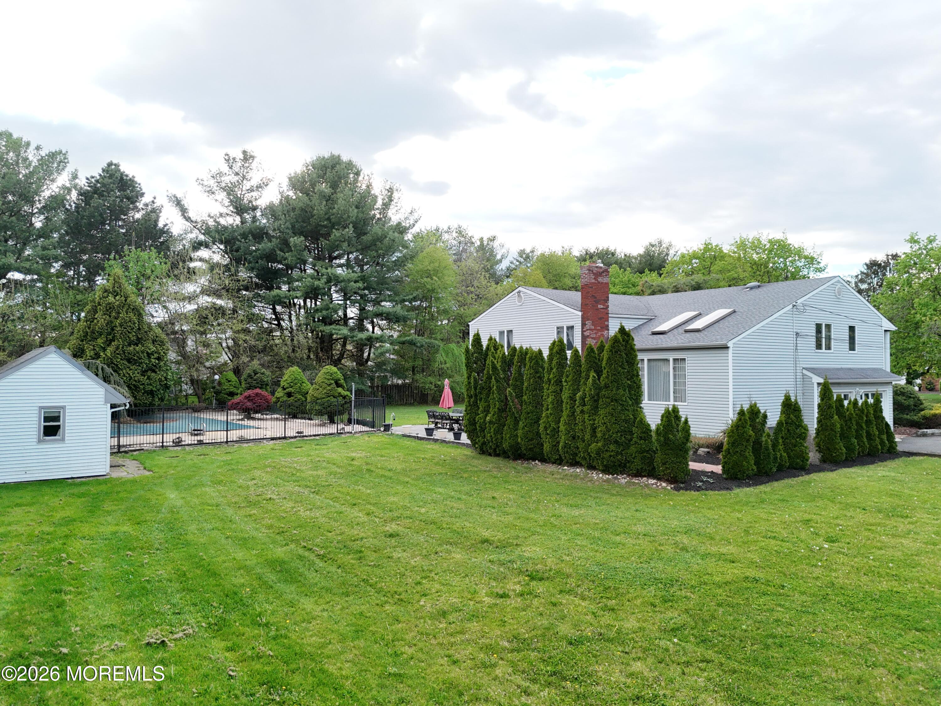 1 Flintlock Road Freehold, NJ 07728 - Photo 30 of 41 Back Angle with Pool