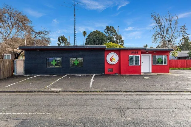 a street sign on a sidewalk