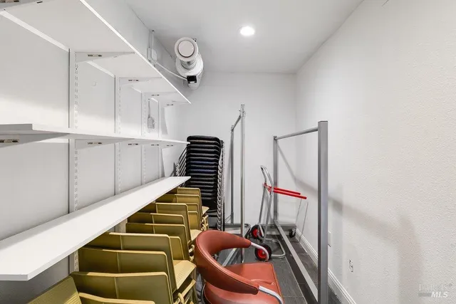 a room with stairs and furniture