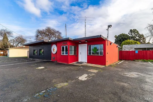 a view of street with red door
