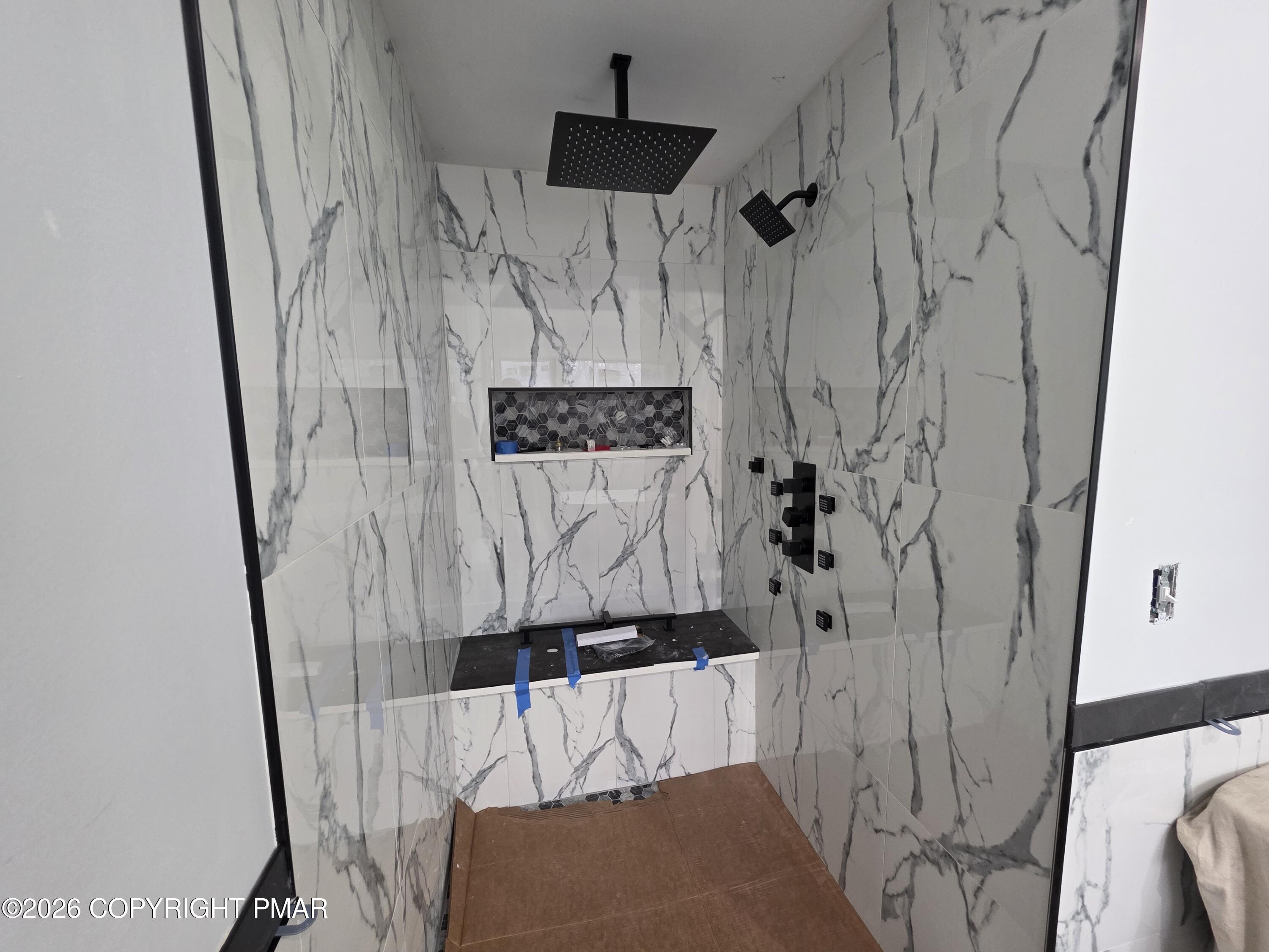 399 Stony Mountain Road Jim Thorpe, PA 18229 - Photo 3 of 4 a bathroom with a bathtub and shower