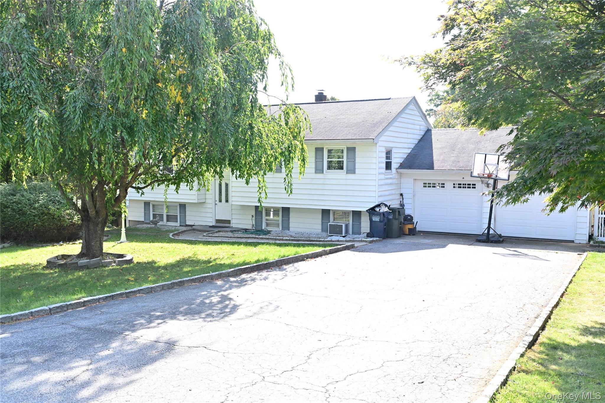 41 Harkin Road Carmel, NY 10512 - Photo 1 of 20 a front view of a house with a yard