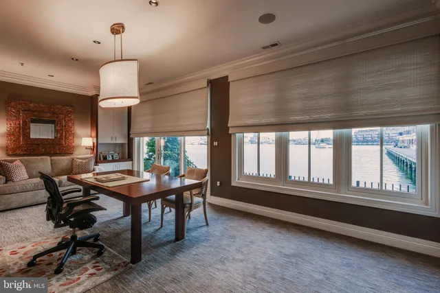 a front view of residential houses with yard