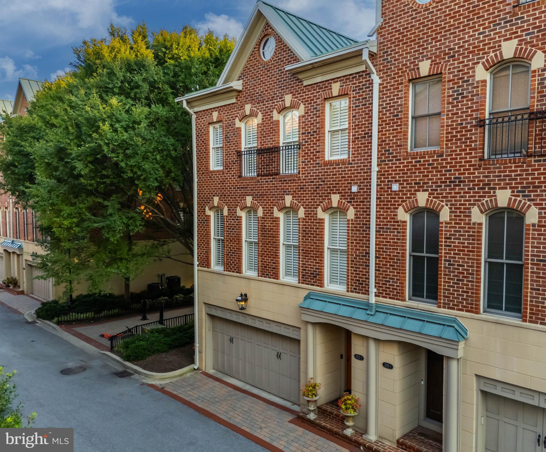 2325 Boston Street, Unit 2 Baltimore, MD 21224 - Photo 13 of 48 a front view of residential houses with yard