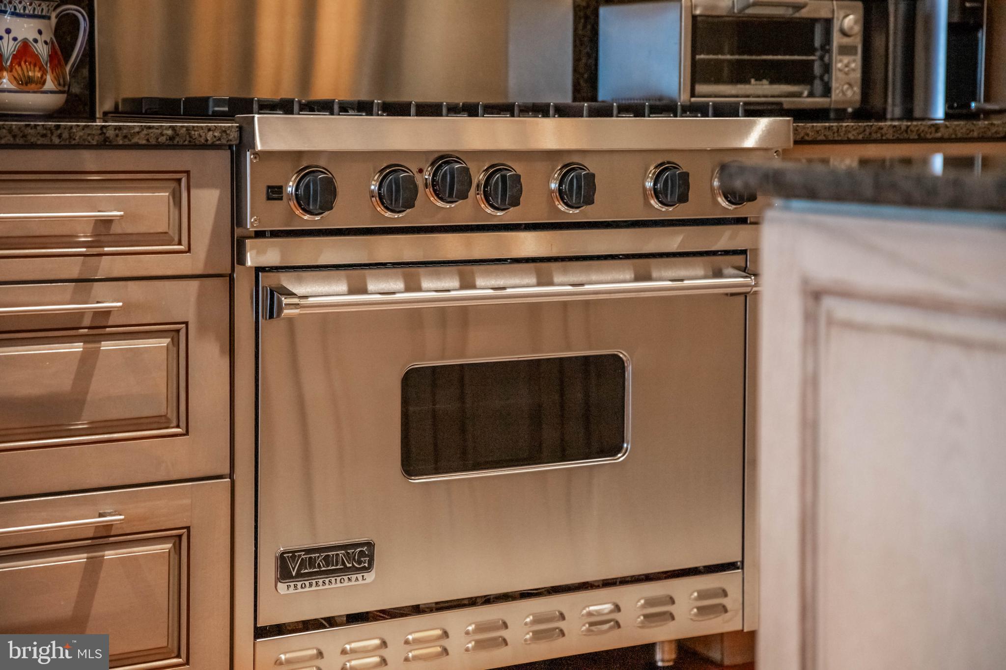 2325 Boston Street, Unit 2 Baltimore, MD 21224 - Photo 16 of 48 a close view of a stove top oven and a stove