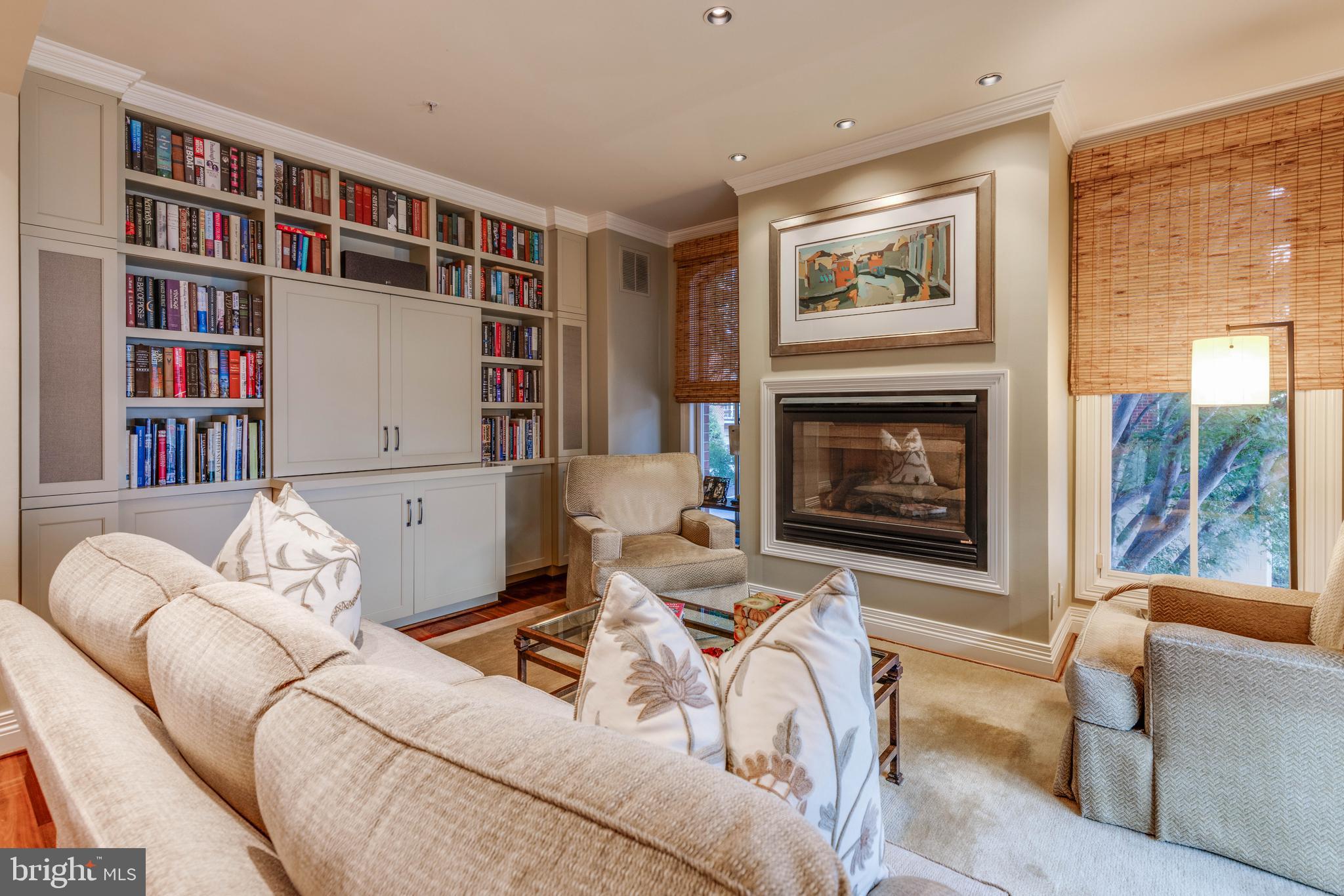 2325 Boston Street, Unit 2 Baltimore, MD 21224 - Photo 17 of 48 a living room with furniture and a fireplace