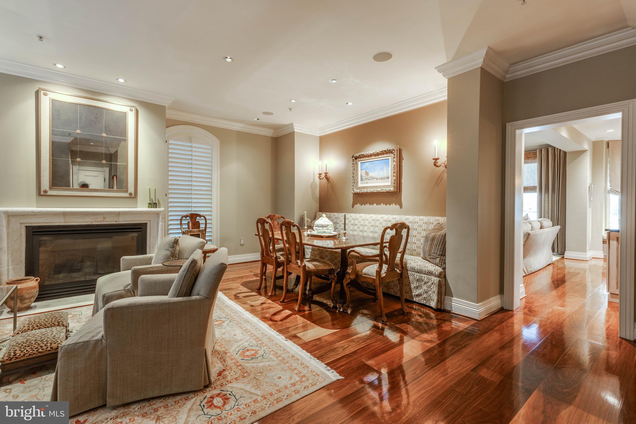 2325 Boston Street, Unit 2 Baltimore, MD 21224 - Photo 26 of 48 a living room with furniture a fireplace and wooden floor