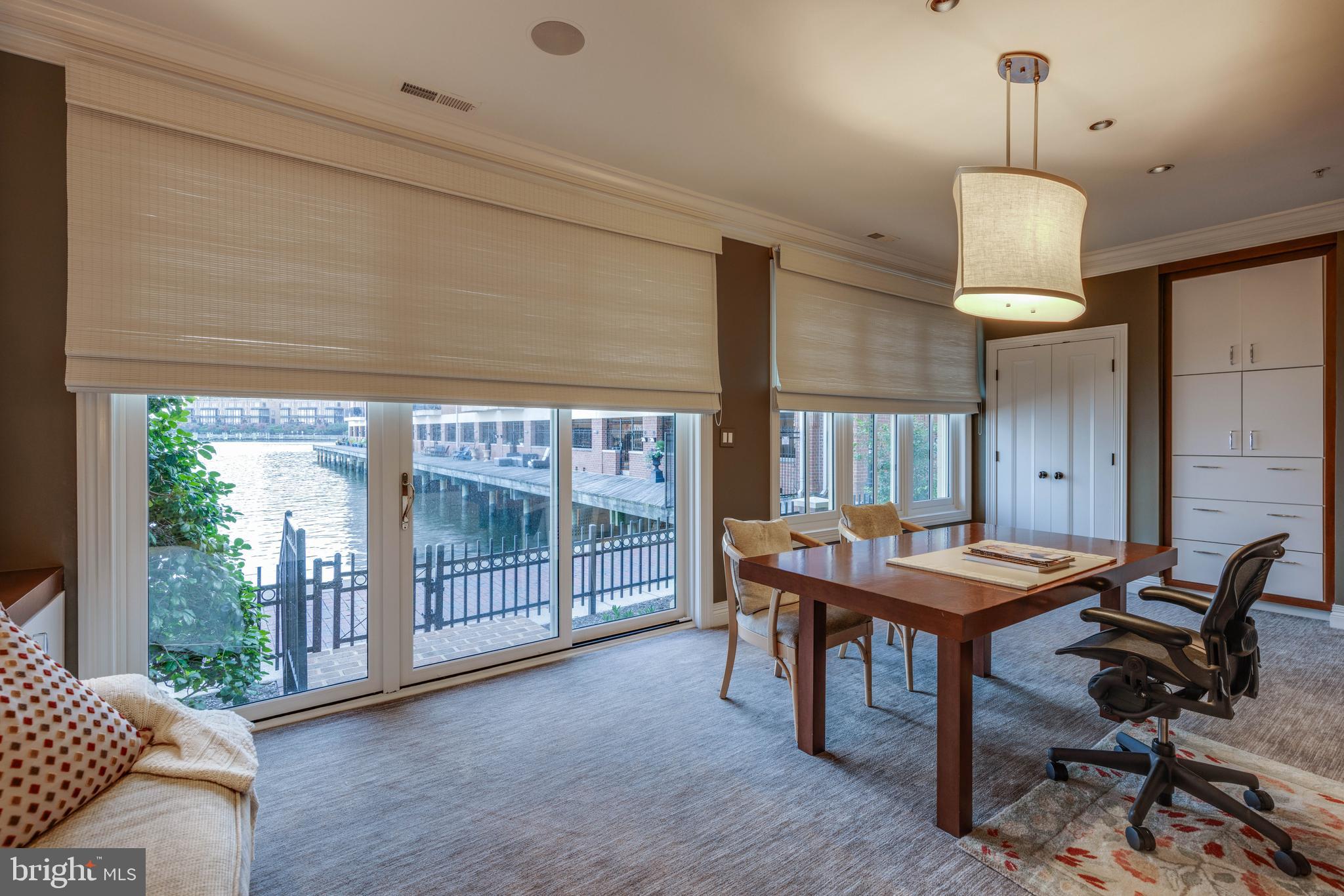 2325 Boston Street, Unit 2 Baltimore, MD 21224 - Photo 31 of 48 a dining room with furniture and window