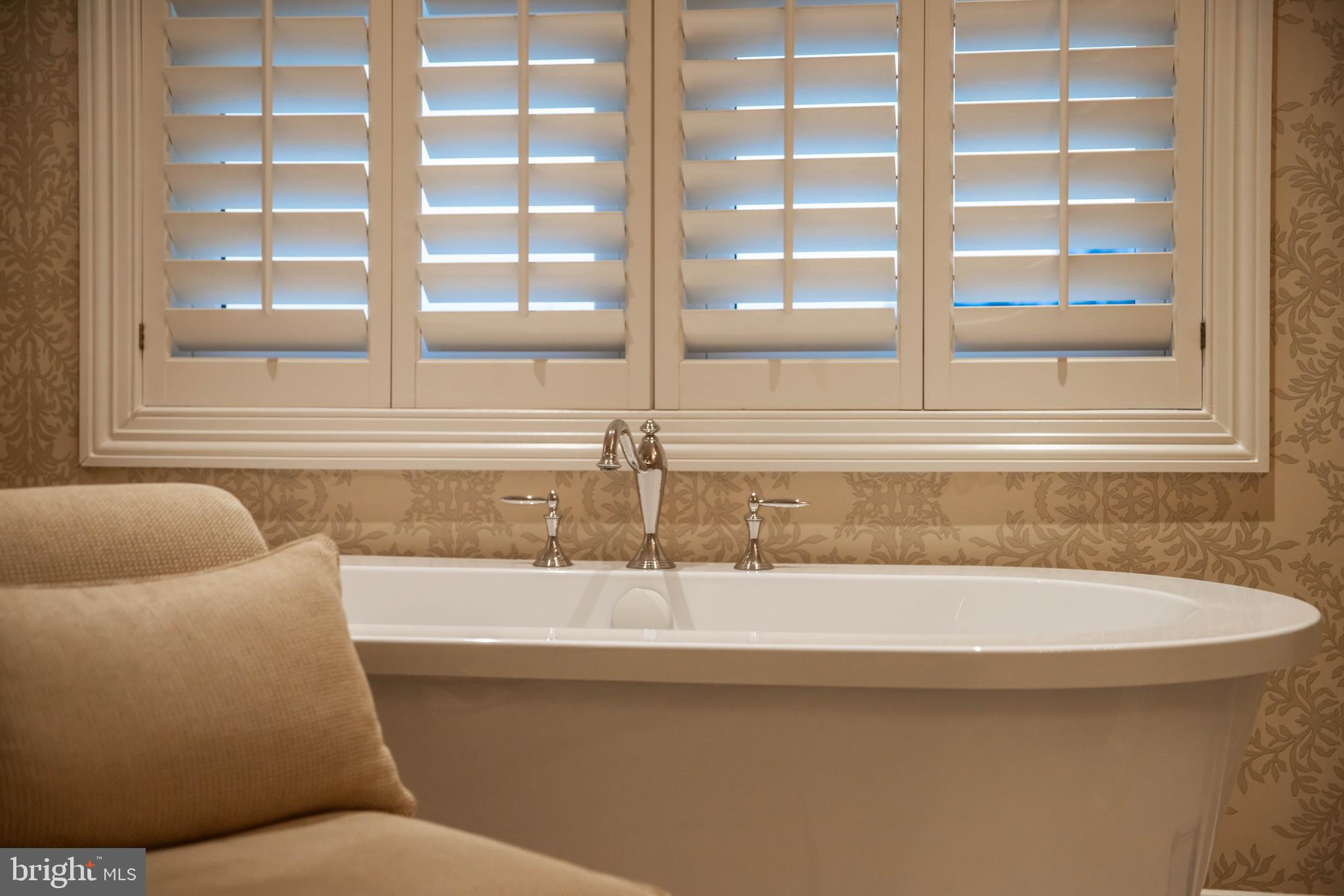 2325 Boston Street, Unit 2 Baltimore, MD 21224 - Photo 38 of 48 a bathroom with a sink and bathtub
