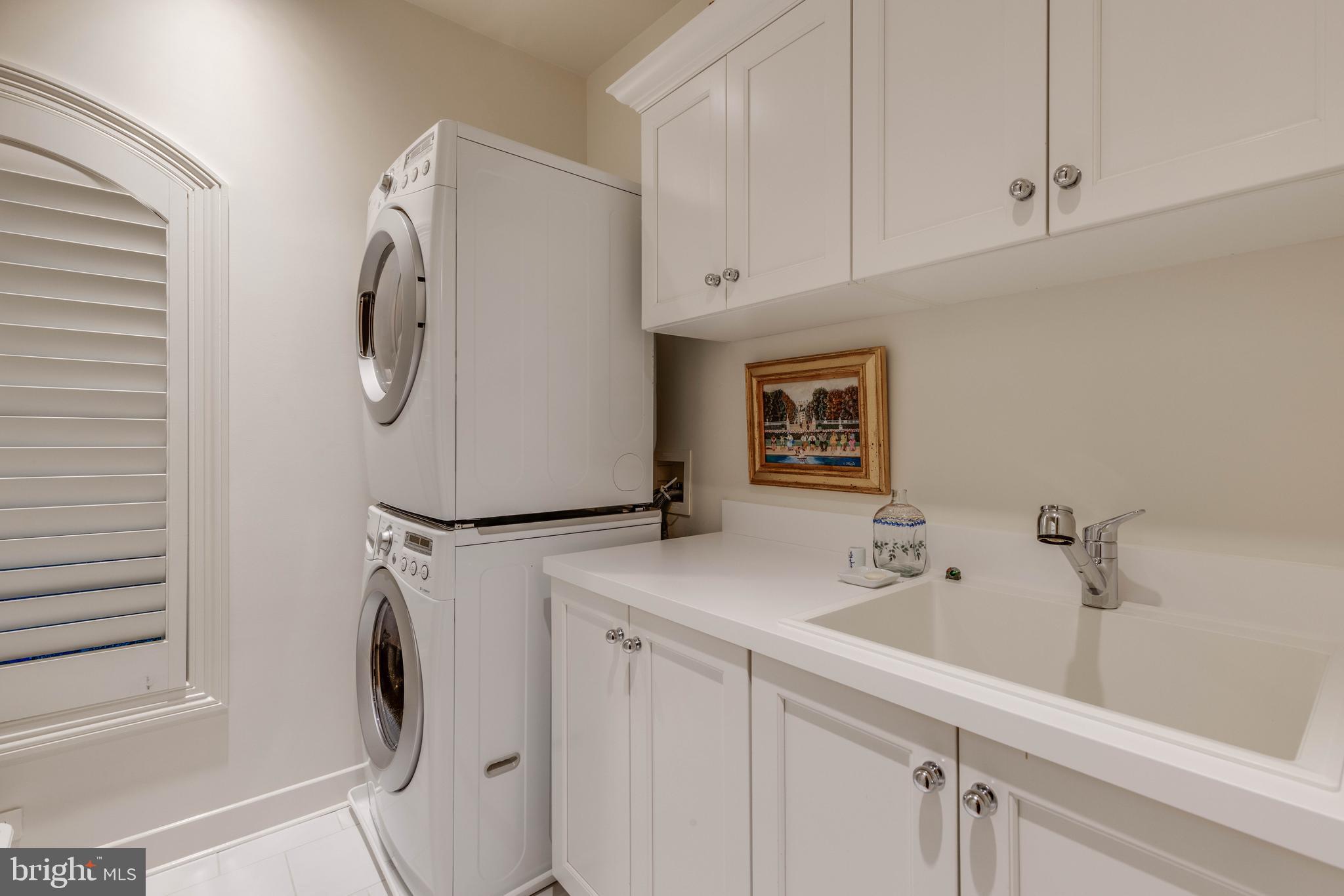 2325 Boston Street, Unit 2 Baltimore, MD 21224 - Photo 40 of 48 a view of a storage and utility room with washer dryer