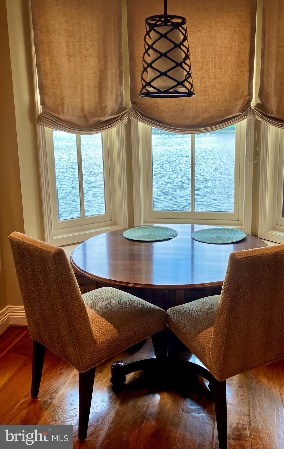 2325 Boston Street, Unit 2 Baltimore, MD 21224 - Photo 8 of 48 a view of a dining room with furniture window and outside view
