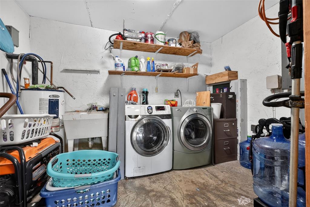 1644 Ruth Street Cocoa, FL 32926 - Photo 20 of 38 a utility room with dryer and washer