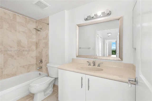 a view of a building and a street