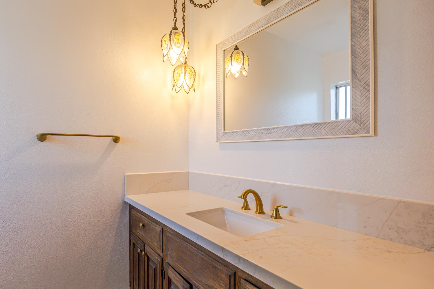 34107 Memory Lane Coarsegold, CA 93614 - Photo 14 of 46 a bathroom with a sink and a window