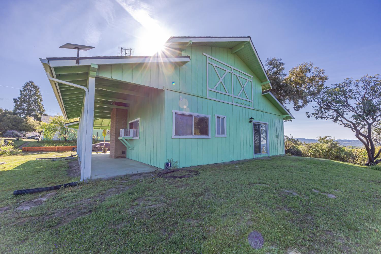 34107 Memory Lane Coarsegold, CA 93614 - Photo 28 of 46 a backyard of a house with lots of green space