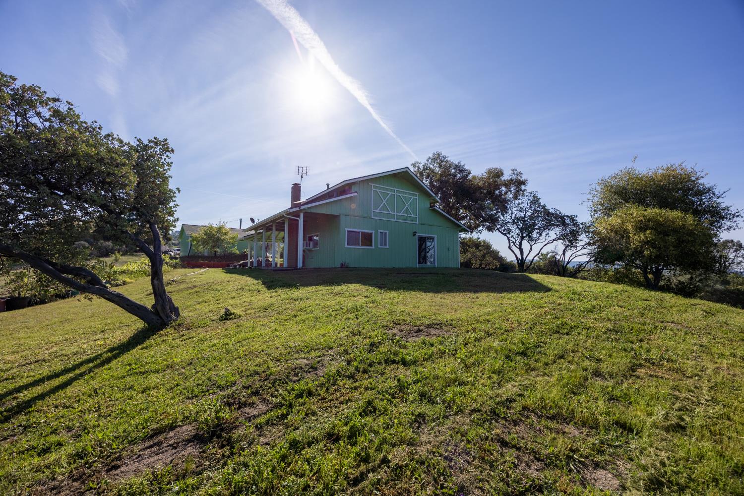 34107 Memory Lane Coarsegold, CA 93614 - Photo 30 of 46 a house view with a garden space